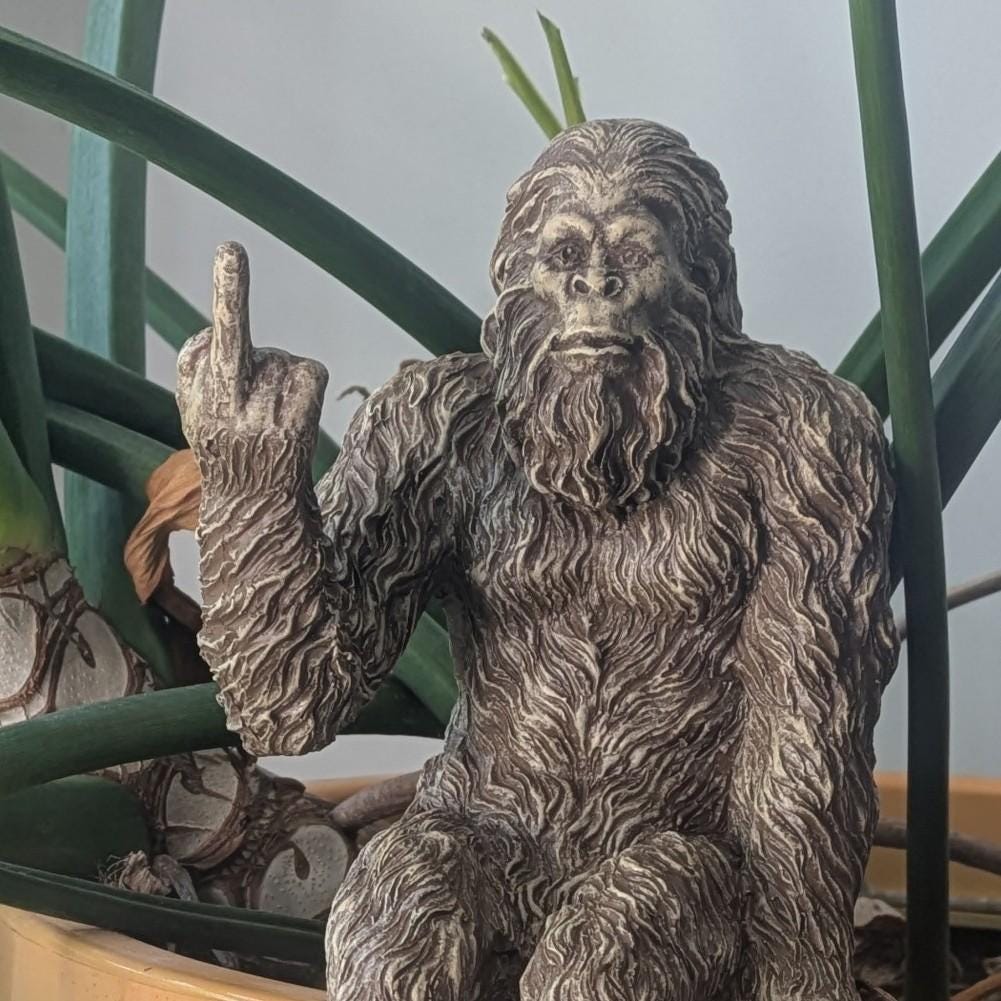 Bigfoot ‘Flipping The Bird’ Sasquatch Yeti Statue Indoor/Outdoor for Patio, Deck, Home, Office 10 in H Shelf Sitter Figurine