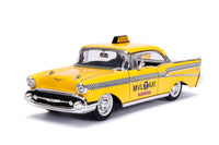 1957 Chevrolet Bel Air Taxi Yellow with Deadpool Diecast Figurine 